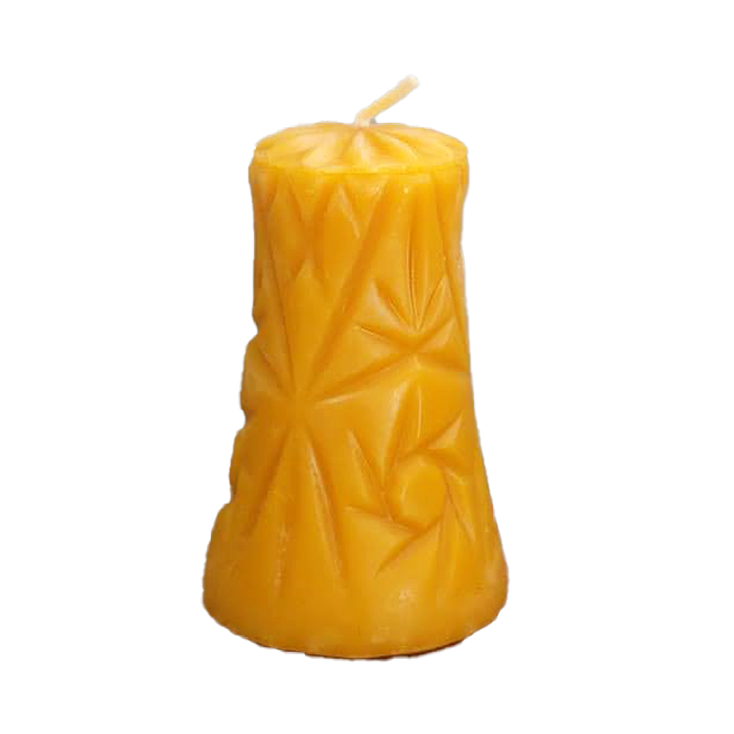 pinwheel shaped candle on rustic desktop