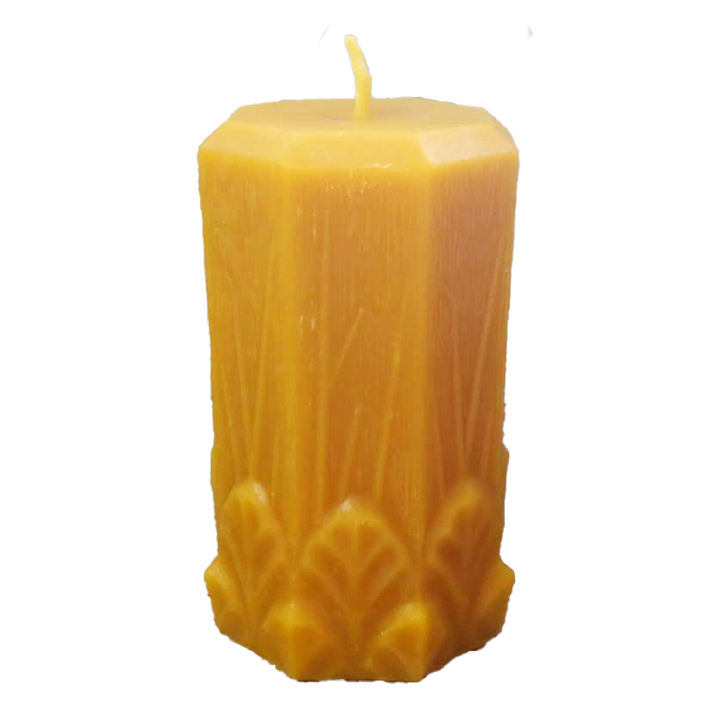 Octagonal pure beeswax candle with garden leaves and grasses at the bottom