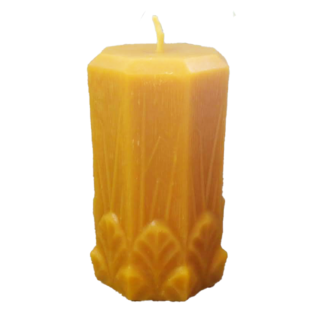 Octagonal pure beeswax candle with garden leaves and grasses at the bottom