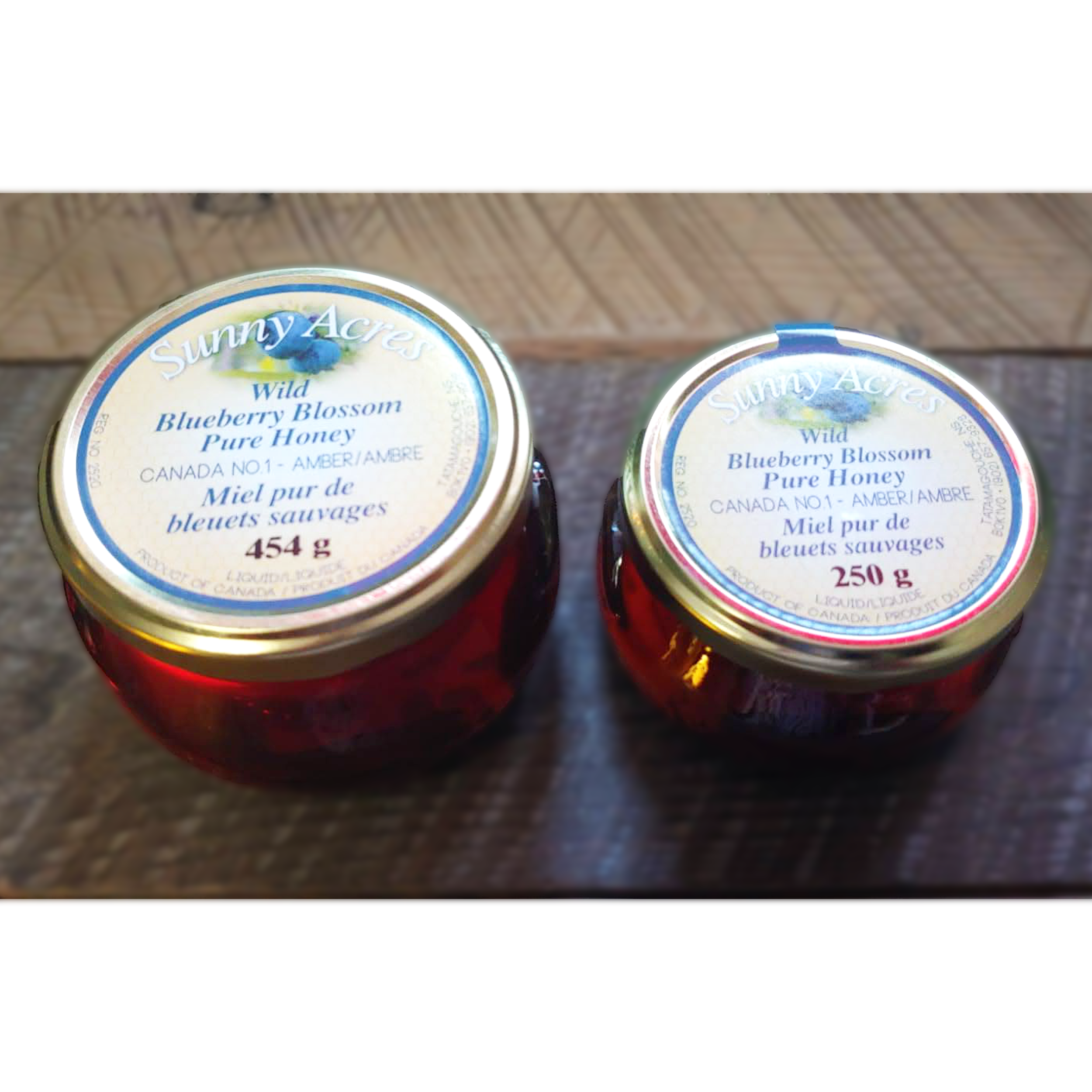 large and small blueberry blossom honey jars